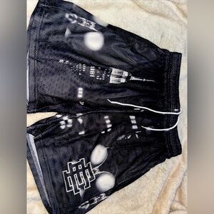 Elevate your summer wardrobe with these stylish Eric Emanuel shorts in classic